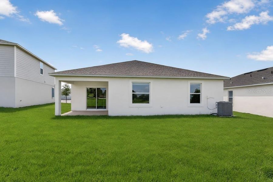 Exterior details and patio area of a home in Waterstone, Groveland (Image 3).