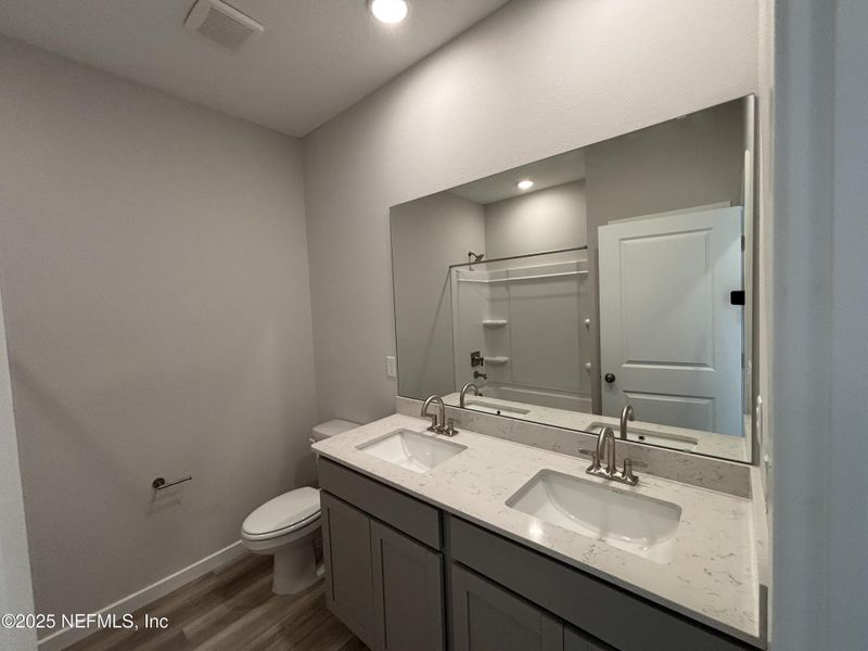 Furnished interior view inside a new home in The Magnolia Series at Reserve East, Flagler Beach (Image 5).