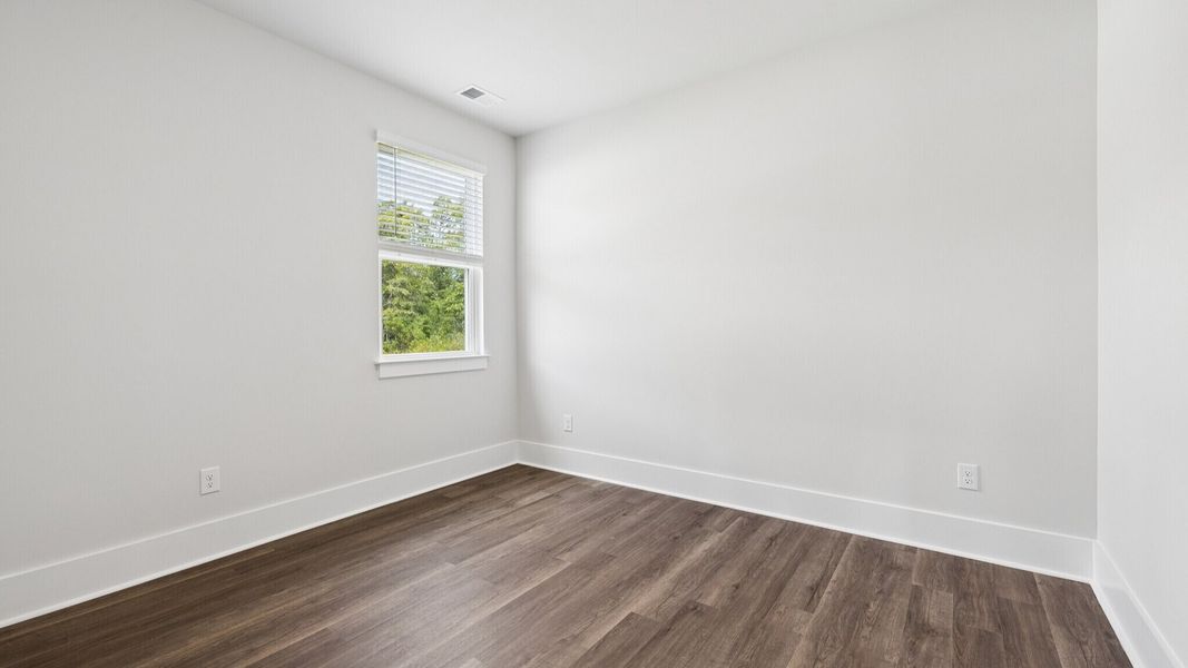Spacious, unfurnished interior of a new home in Sidbury Station, Castle Hayne (Image 11).