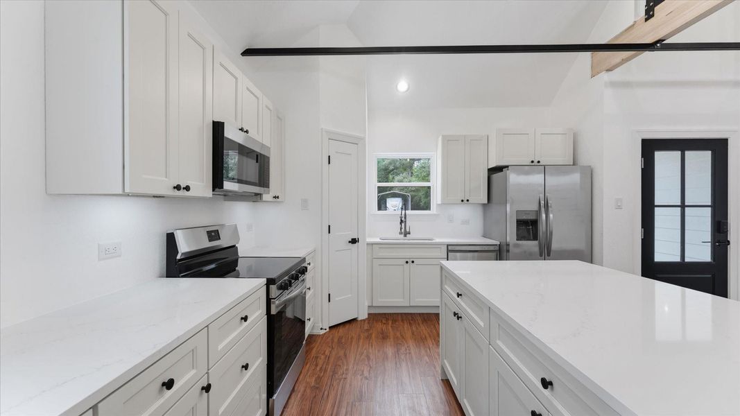 Furnished interior view inside a new home in , Conroe (Image 6).
