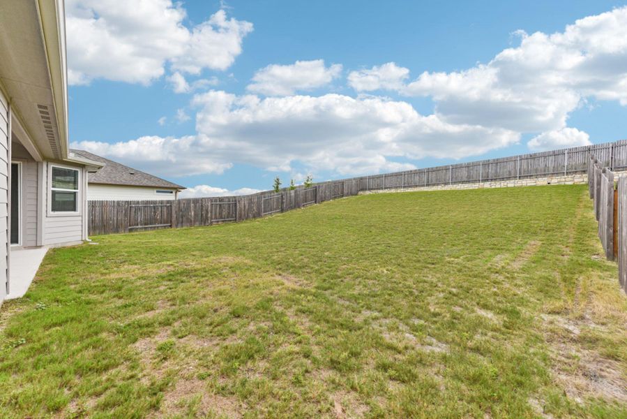 TONS of space to build a backyard oasis