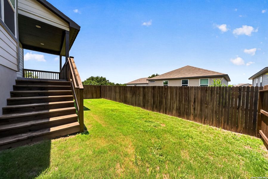 Exterior details and patio area of a home in Thomas Pond, San Antonio (Image 34).