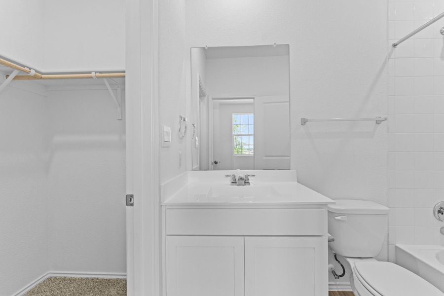 Furnished interior view inside a new home in Valverde, Bastrop (Image 13).
