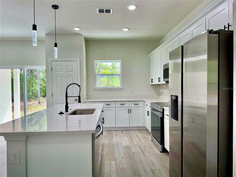 Furnished interior view inside a new home in , Dunnellon (Image 5).