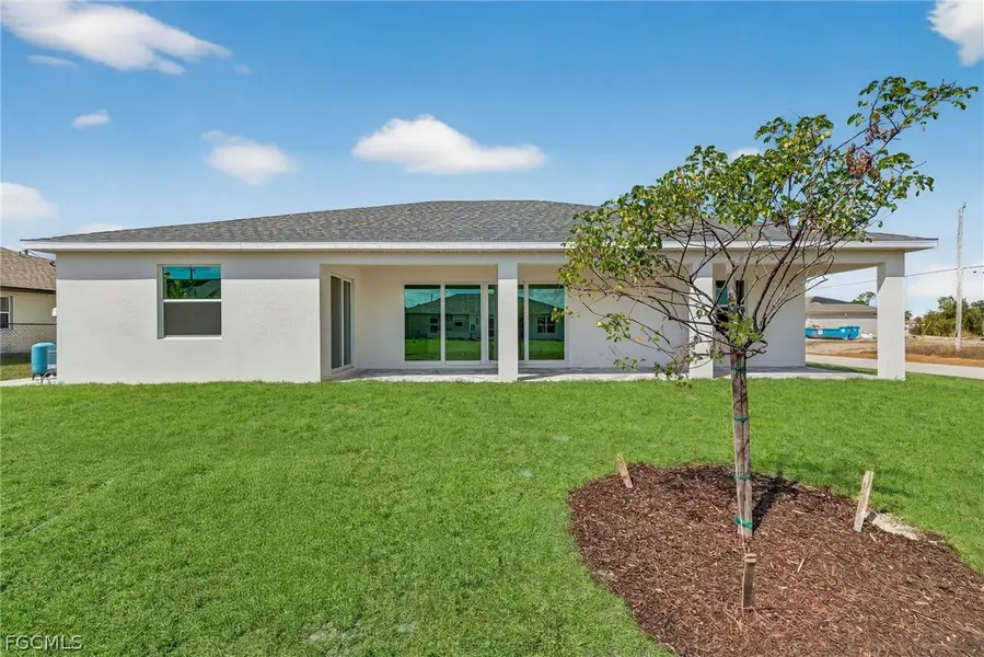 Exterior details and patio area of a home in Cape Coral, Cape Coral (Image 3).