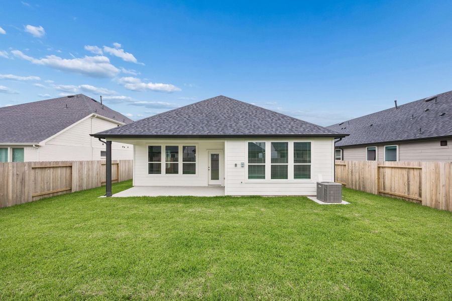 Exterior details and patio area of a home in Montgomery Bend, Montgomery (Image 3).