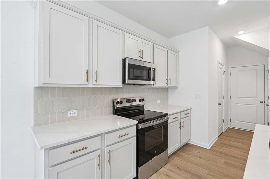 Furnished interior view inside a new home in Leydenview, Mableton (Image 16).