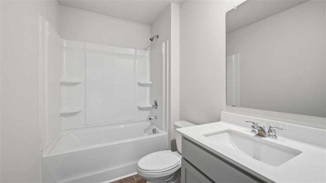 Furnished interior view inside a new home in The Preserve at Agricultural Village, Perry (Image 11).