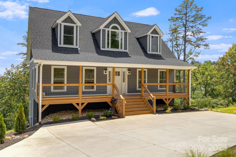 Front exterior of a new home in , Asheville, NC, highlighting curb appeal (Image 23).