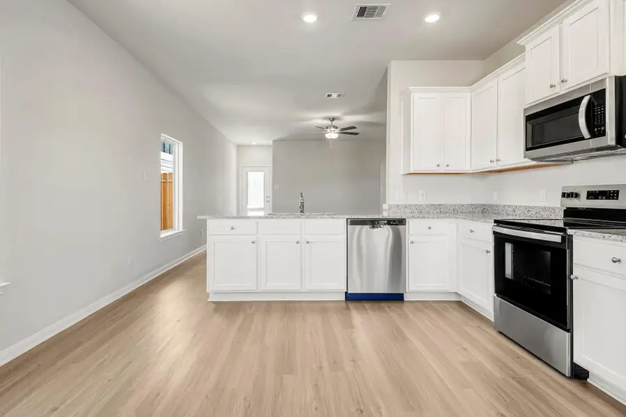 Furnished interior view inside a new home in Wayside Village, Houston (Image 4).