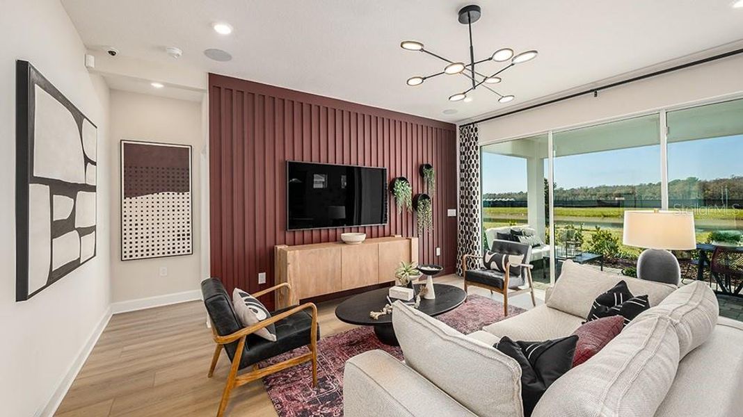 Furnished interior view inside a new home in Esplanade at McKinnon Groves, Winter Garden (Image 3).