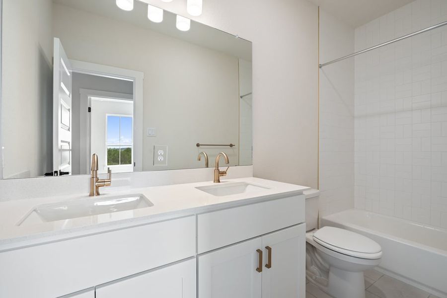 Furnished interior view inside a new home in Arbor Collection At Wolf Ranch, Georgetown (Image 17).