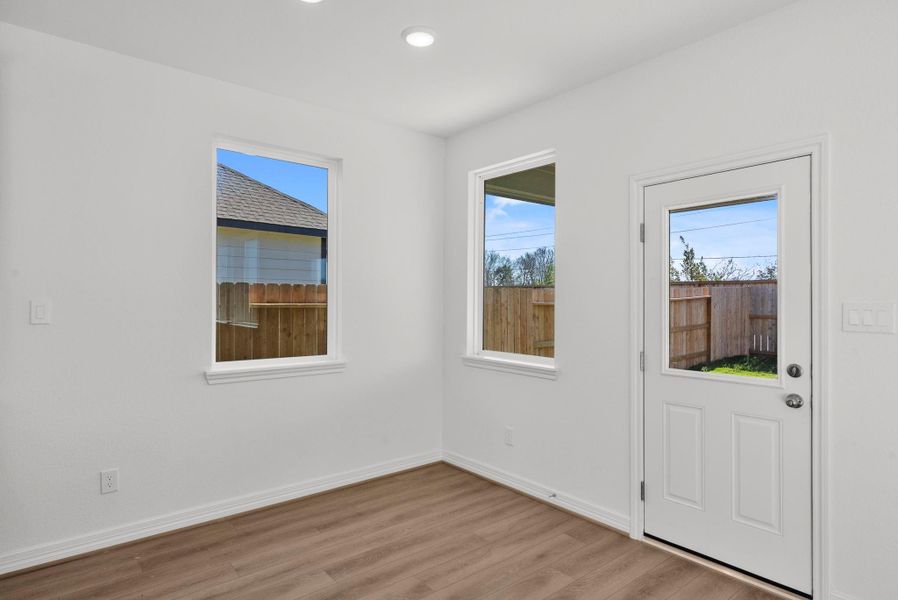 Casual and cozy breakfast area with access to back patio.