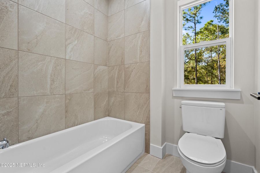 Furnished interior view inside a new home in SilverLeaf, St. Augustine (Image 13).