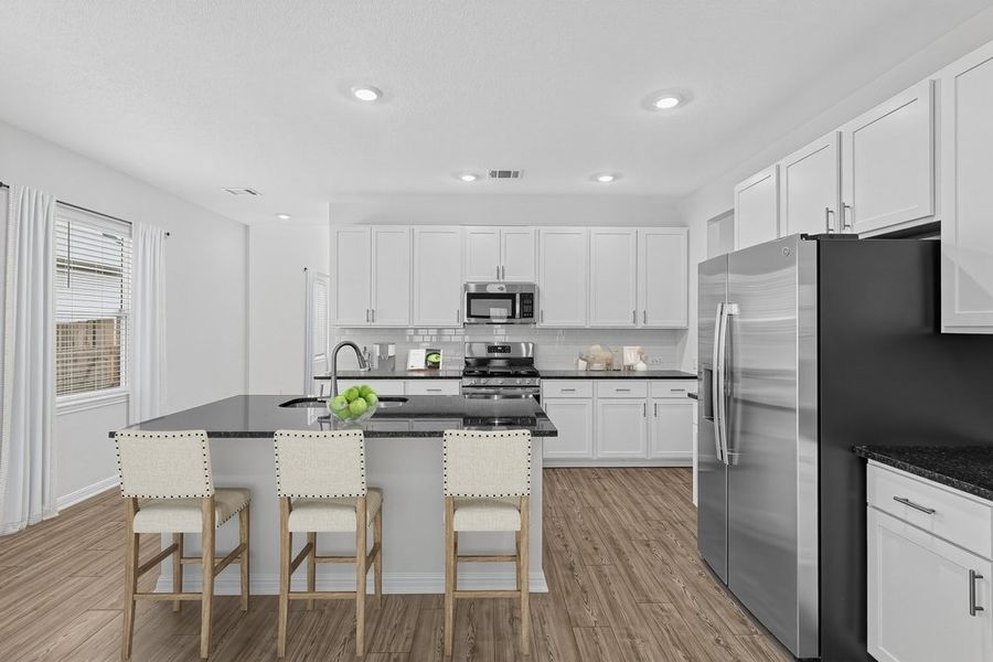 Furnished interior view inside a new home in Sunfield, Buda (Image 9).