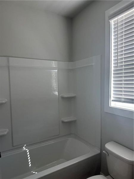 Furnished interior view inside a new home in The Fairways at Mirror Lake, Villa Rica (Image 8).