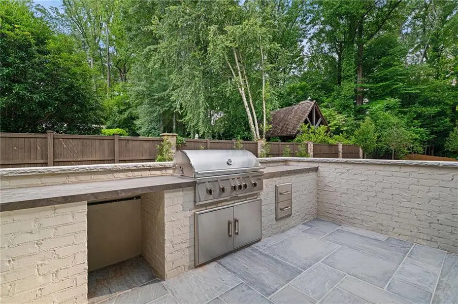 Exterior details and patio area of a home in , Atlanta (Image 29).