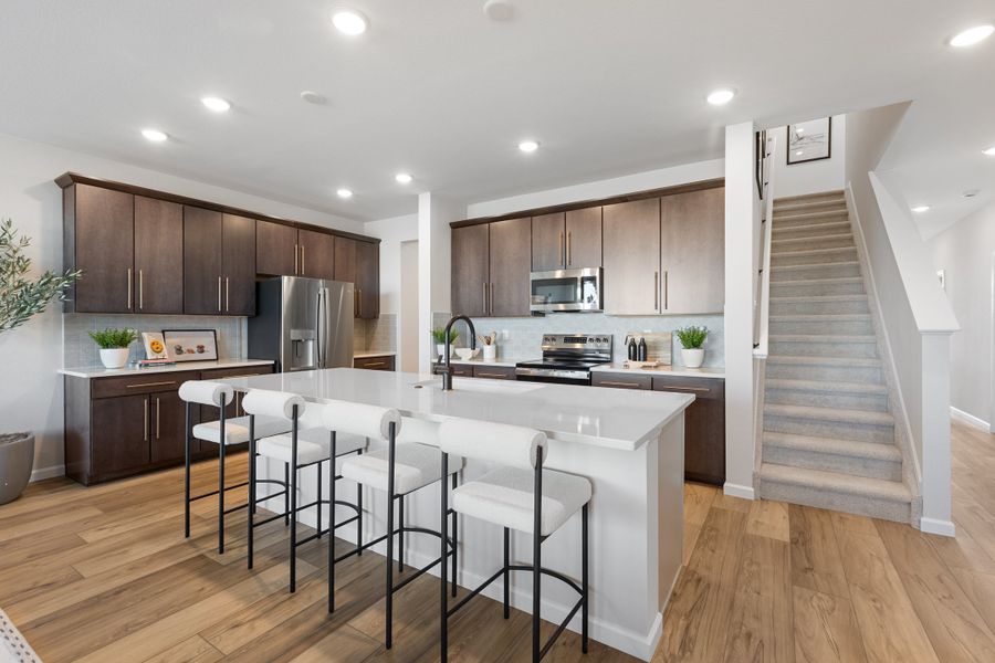Representative furnished interior of a home built from the The Windom by Risewell Homes in Cordovan, Firestone (Image 6).