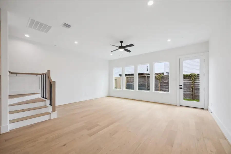 Natural light flows into the first floor living area Natural light flows into the first floor living area