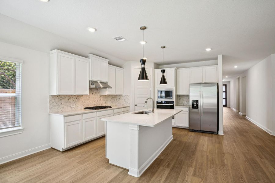 Photo is not of the actual home, but is an inspirational photo of builder’s model home and may depict options, furnishings, and/or decorator features that are not included