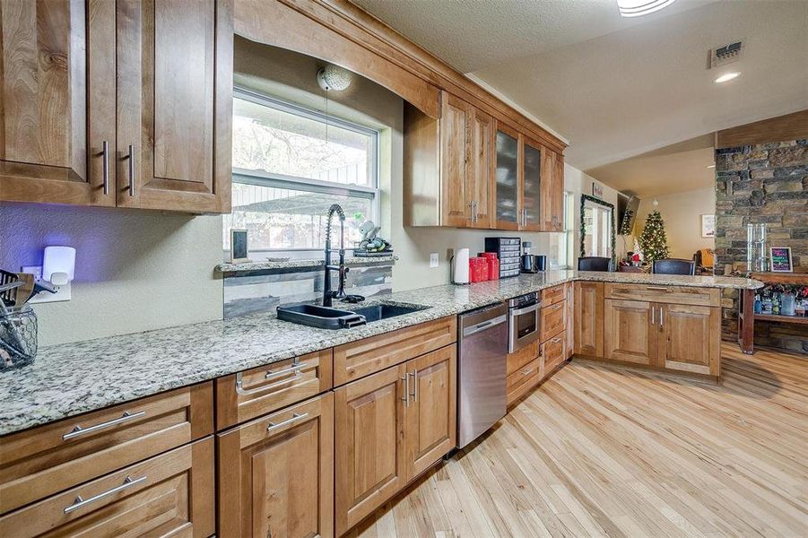 Kitchen with granite countertops.