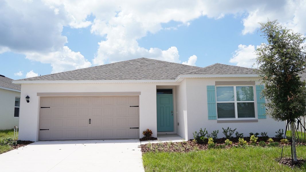 Front exterior of a new home in Hamilton Bluff, Lake Hamilton, FL, highlighting curb appeal (Image 1).