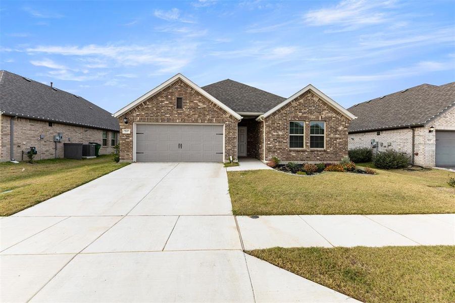 Front exterior of a new home in , Venus, TX, highlighting curb appeal (Image 23). Front exterior of a new home in , Venus, TX, highlighting curb appeal (Image 23).