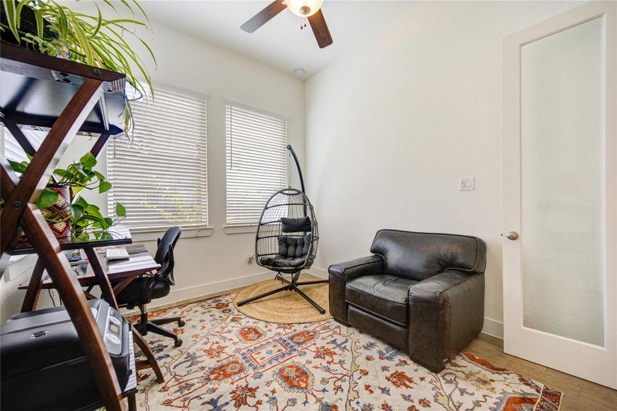Large windows bring in natural light, creating an inviting space for work, reading, or relaxation. Large windows bring in natural light, creating an inviting space for work, reading, or relaxation.