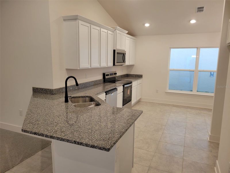 Furnished interior view inside a new home in Arbor Park, Leesburg (Image 4).