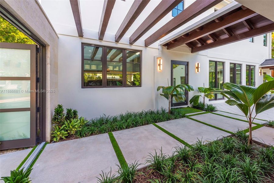 Exterior details and patio area of a home in , Coral Gables (Image 23). Exterior details and patio area of a home in , Coral Gables (Image 23).