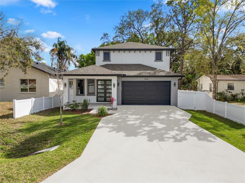 Front exterior of a new home in , Tampa, FL, highlighting curb appeal (Image 2).