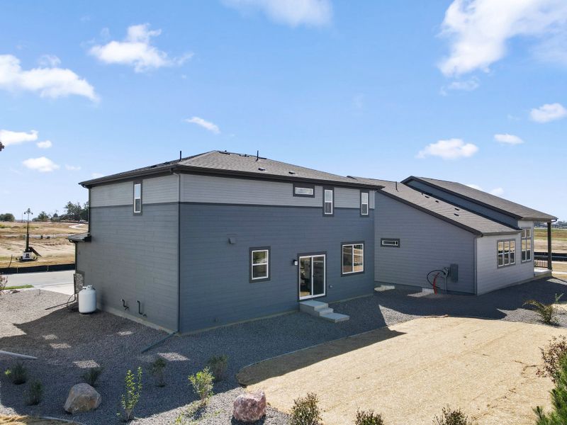 Representative exterior details of a home built from the 4006 by Risewell Homes in Mead Crossing, Mead (Image 3).