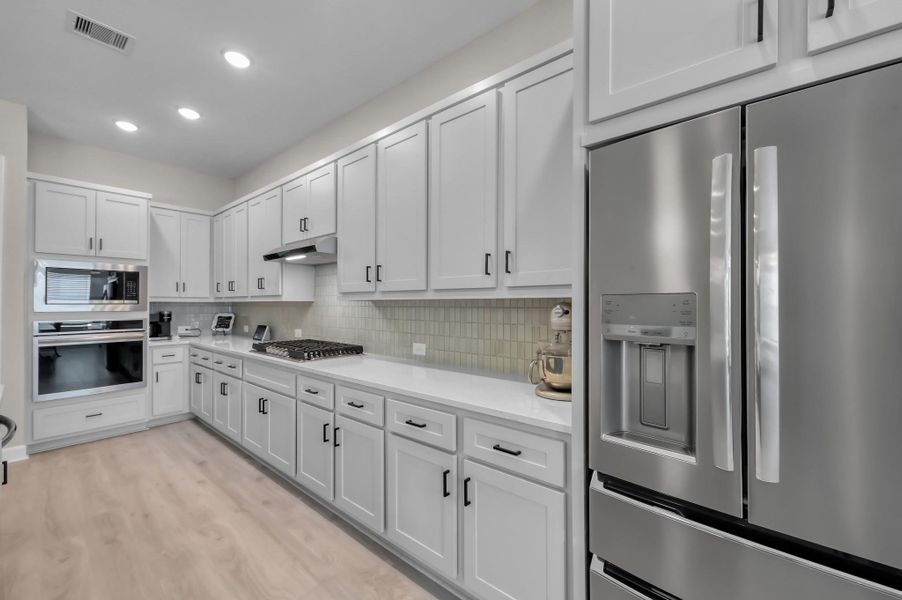 Furnished interior view inside a new home in The Woodlands Hills 60’, Willis (Image 18).