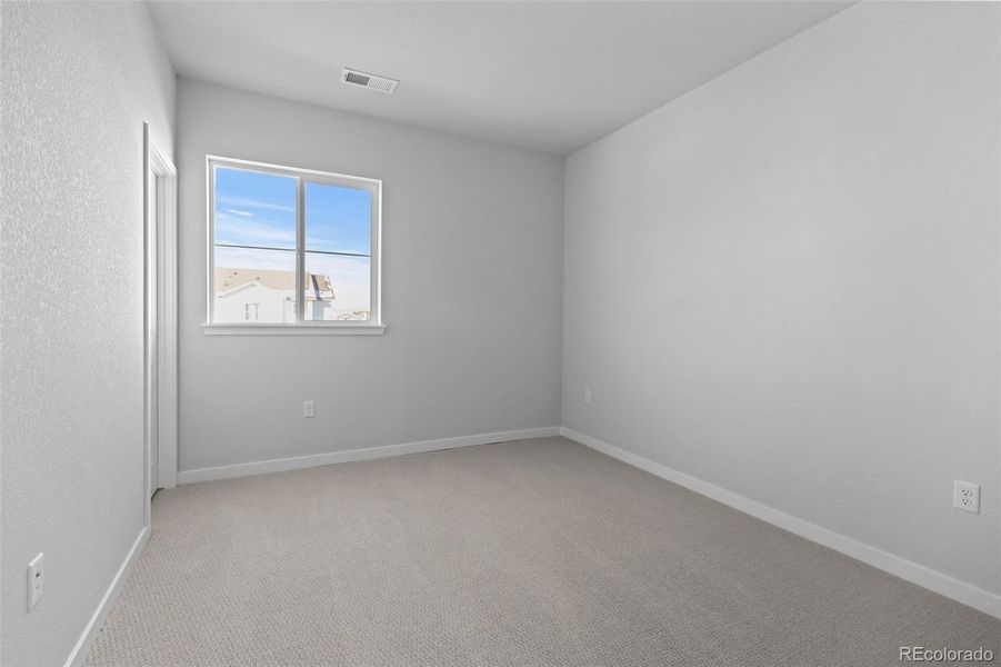 Spacious, unfurnished interior of a new home in Trails at Smoky Hill, Parker (Image 24).