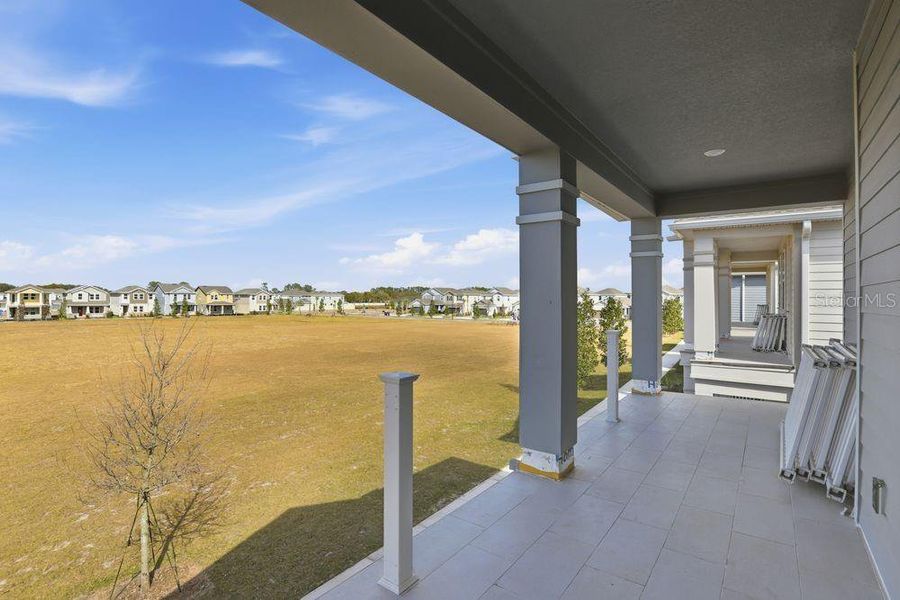 Exterior details and patio area of a home in Center Lake Ranch Community Group Page, St. Cloud (Image 4).