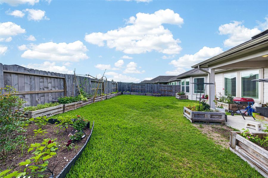Exterior details and patio area of a home in Wall Street Village, Richmond (Image 24).