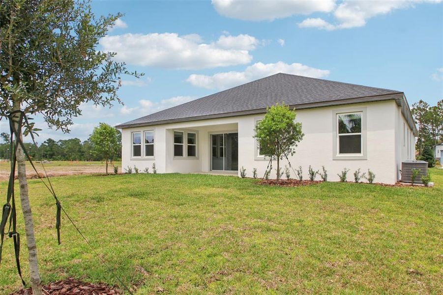 Exterior details and patio area of a home in Ridgehaven - Reserve Series, Ormond Beach (Image 21).