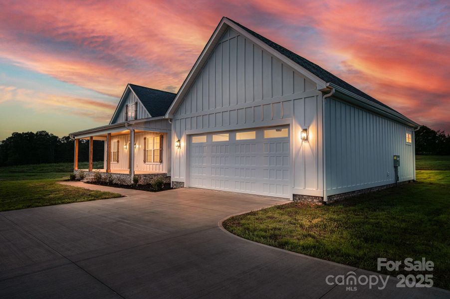 Front exterior of a new home in , Vale, NC, highlighting curb appeal (Image 28).
