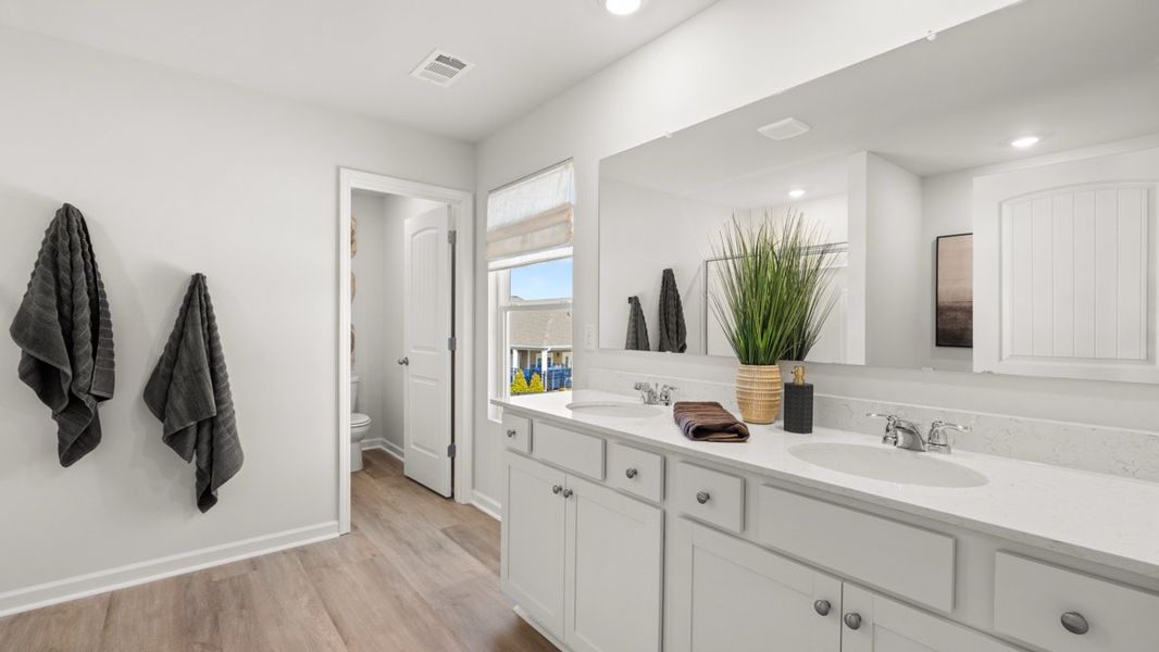 Representative furnished interior of a home built from the Elbert ll by D.R. Horton in Braselton Village, Braselton (Image 23).