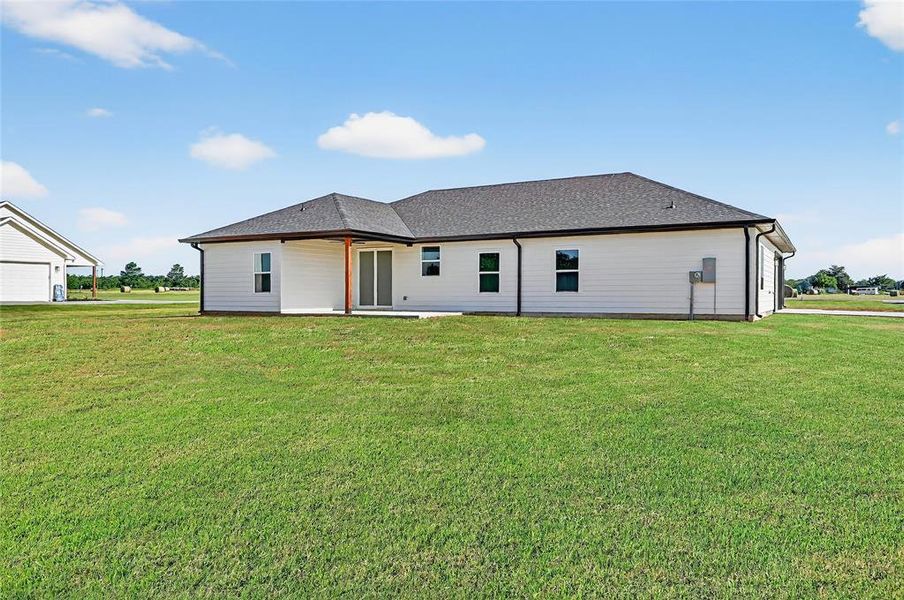 Front exterior of a new home in , Sadler, TX, highlighting curb appeal (Image 28). Front exterior of a new home in , Sadler, TX, highlighting curb appeal (Image 28).