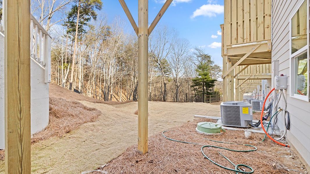 Exterior details and patio area of a home in Greyton Springs Place, Buford (Image 19).