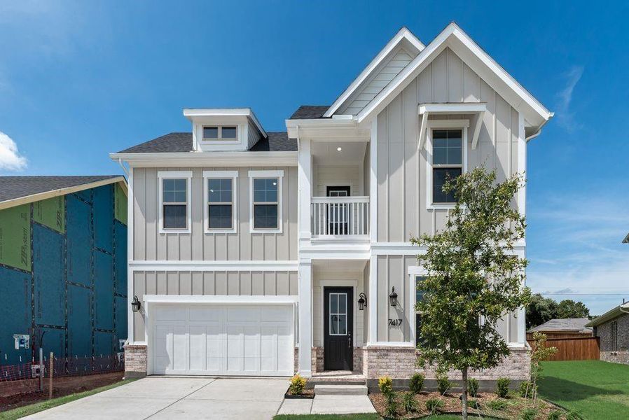 Front exterior of a new home in Bayside, Rowlett, TX, highlighting curb appeal (Image 2).