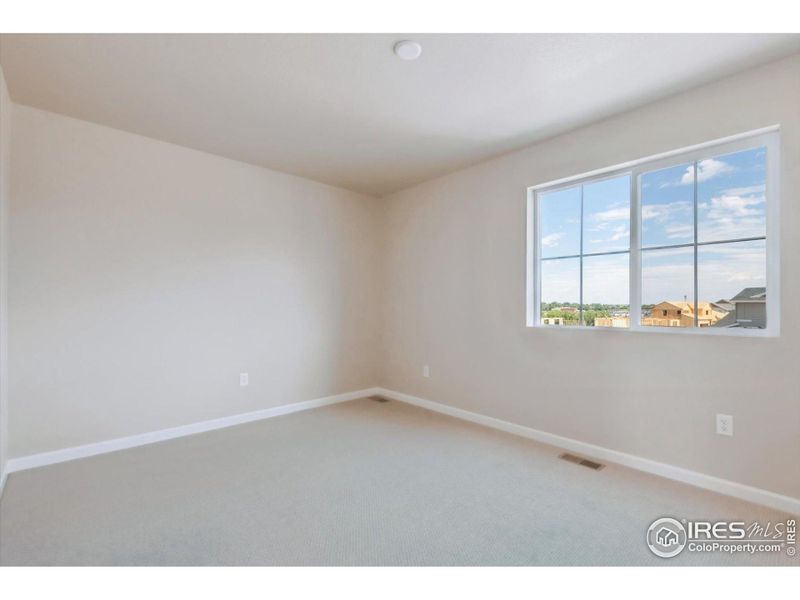 Spacious, unfurnished interior of a new home in The Overlook at Johnstown Farms, Johnstown (Image 18).