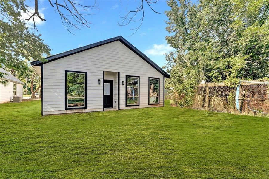 Exterior details and patio area of a home in , Denison (Image 18).