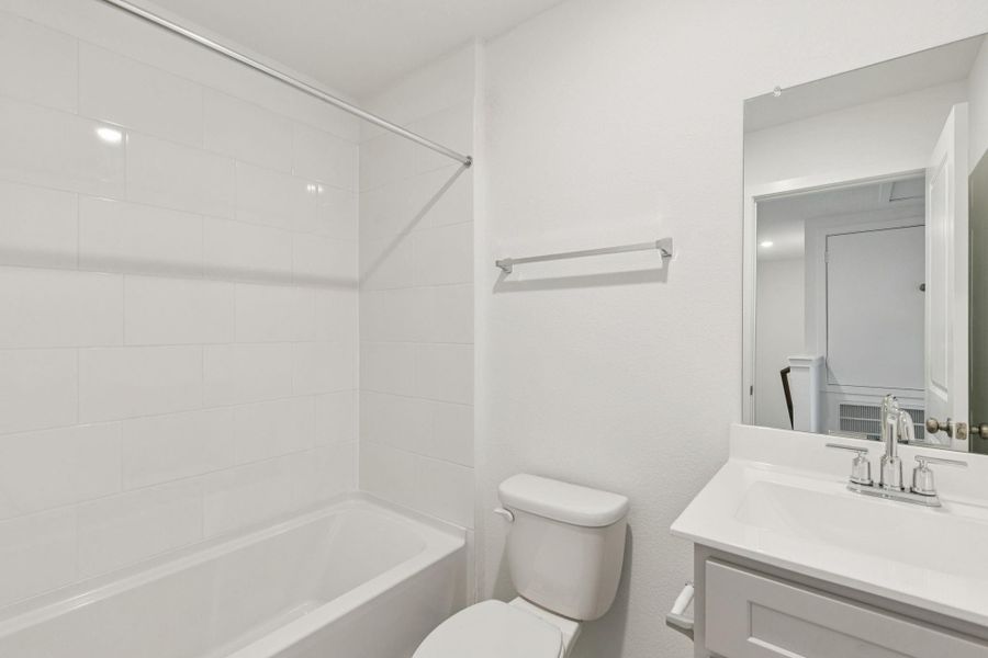 Furnished interior view inside a new home in Decker Farms, Magnolia (Image 15).