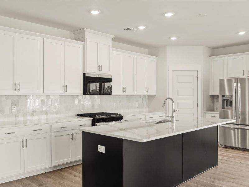 Furnished interior view inside a new home in The Coves at Lakes of Cane Bay, Summerville (Image 10).