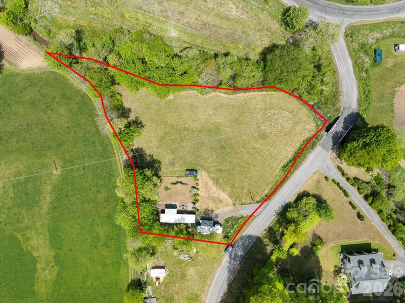 Over 1 acre bordered by 2 creeks