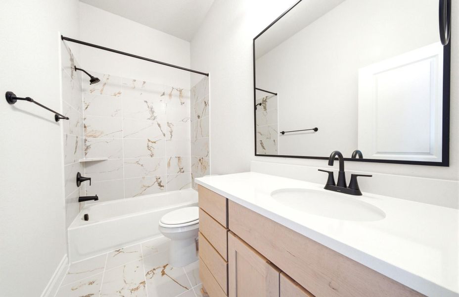 Furnished interior view inside a new home in Bridgeland 50', Cypress (Image 15).