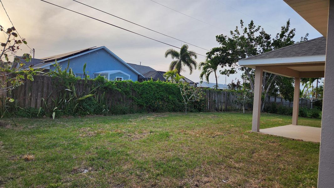Front exterior of a new home in Gatlin, Port St. Lucie, FL, highlighting curb appeal (Image 15).