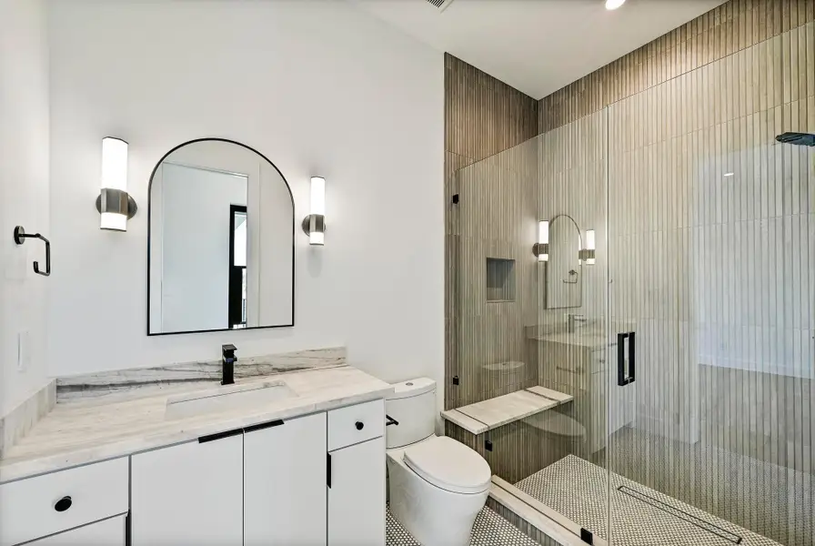 En suite bathroom for bedroom 2. Also, used for guest bath. En suite bathroom for bedroom 2. Also, used for guest bath.